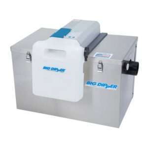 A stainless steel Big Dipper self-cleaning grease trap with a white plastic component, black side outlet, metal latches, and a blue control panel on top for automatic grease removal.