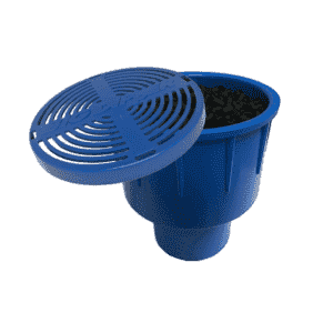 A blue plastic cylindrical container with a grated, round lid partially open, showing black granular material inside. This resembles an automatic oil and grease separator with a wide top that narrows toward the bottom.