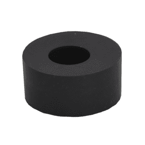 A black rubber cylindrical washer with a large central hole, often used in self-cleaning grease trap systems, viewed from a slightly elevated angle against a plain white background.
