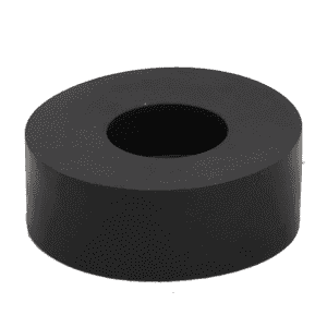 A black, solid, cylindrical object with a large central hole—resembling a thick washer or doughnut—placed against a plain white background, often used in automatic oil and grease separator systems for efficient grease removal.