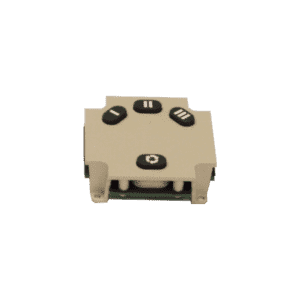 A beige rectangular electronic panel with four black buttons featuring white icons—play/pause, stop, fast forward, and a circular arrow—is mounted on a green circuit board for an automatic grease removal system.