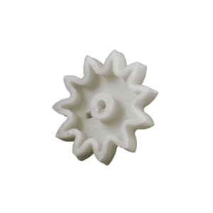A white plastic gear with twelve rounded teeth and a central hole, viewed from above on a plain white background, designed for use in an automatic oil and grease separator system.